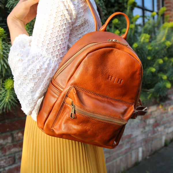 Small backpack, Calfskin & gold-tone metal, orange — Fashion